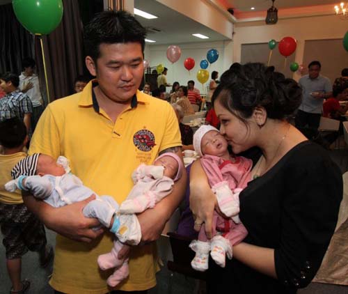 Malaysia's first frozen embryo test tube triplets full moon celebration